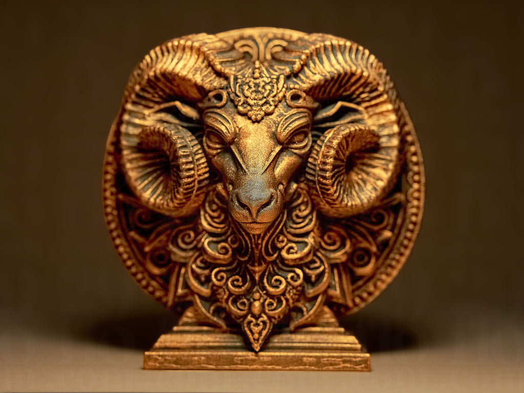 Decorative ram head sculpture with intricate designs on a brown background